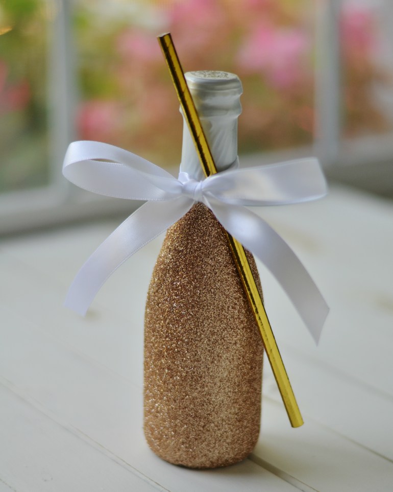 DIY Glittered Champagne Bottle | Minted Bold