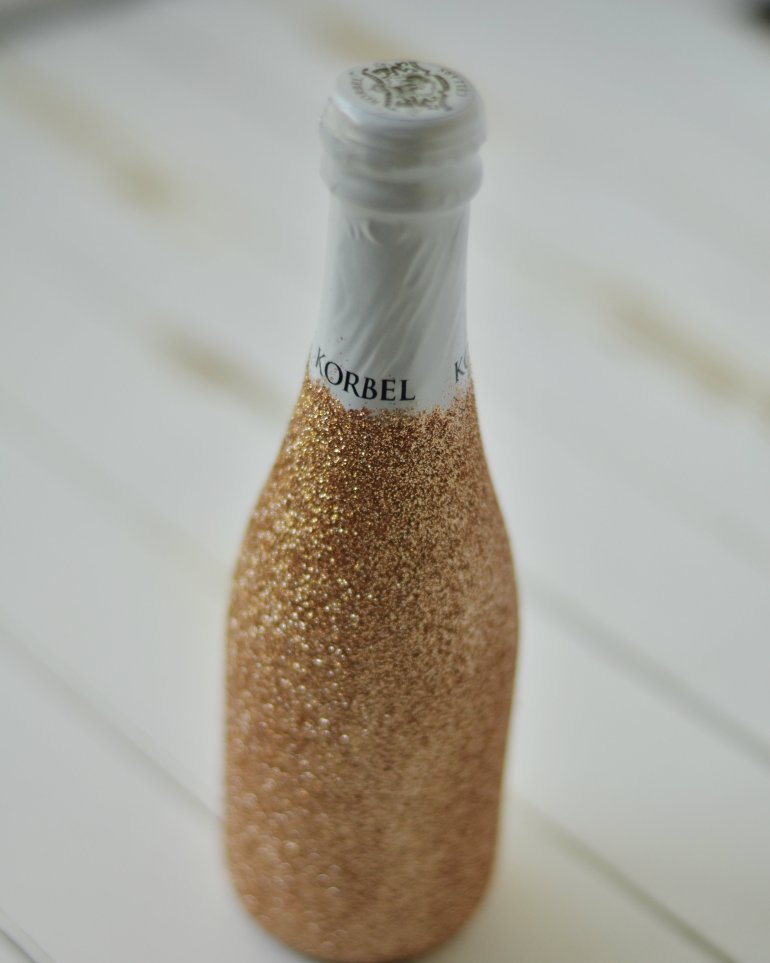 DIY Glittered Champagne Bottle | Minted Bold